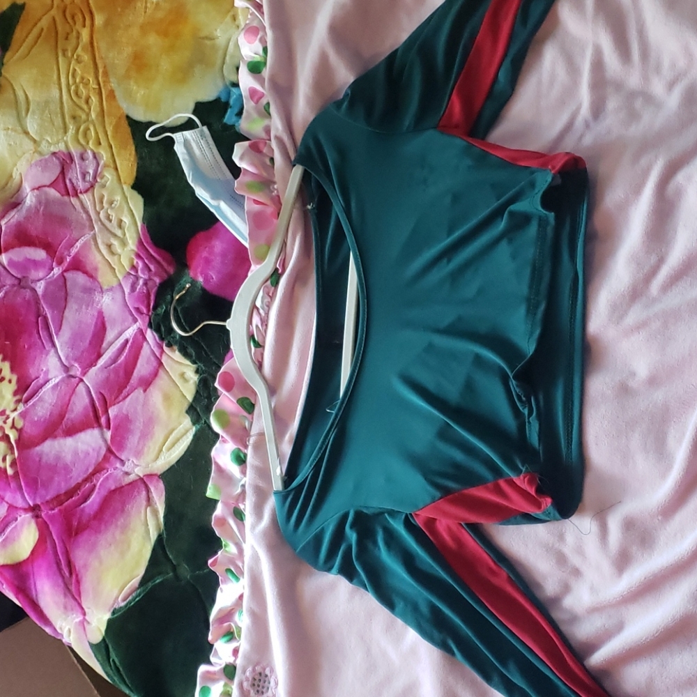 Green crop top with Red lining on the arms